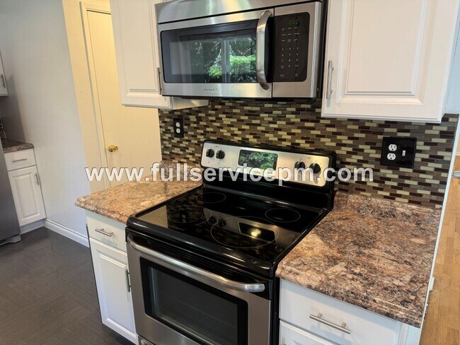 Building Photo - Spacious 4-Bedroom Upper-Level Home with Fireplace, Bonus Room & Large Deck
