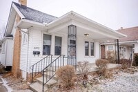 Building Photo - Beautiful two bedroom home with bonus room, fenced in back yard, garage, and full basement!