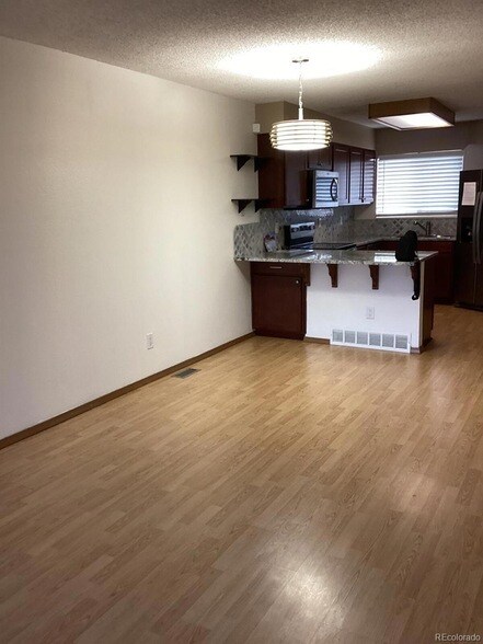 Building Photo - 8733 W Cornell Ave