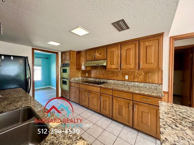 Building Photo - Available Early July: House Built for a Family