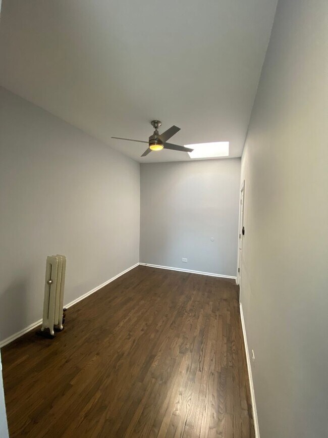 Building Photo - Logan Square 2BR with In-Unit Laundry + WiFi