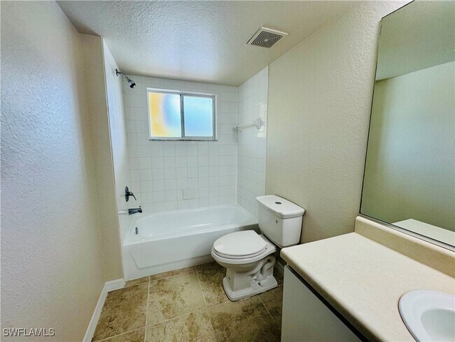 Building Photo - 8304 Key Royal Cir