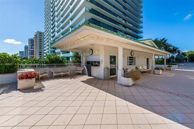 Building Photo - 10205 Collins Ave