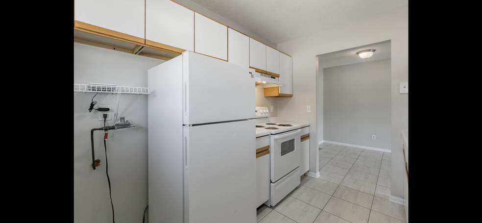 Building Photo - 6406 83rd Ct N