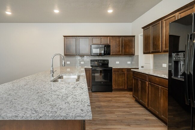 Building Photo - Where Style Meets Comfort: Elevate Your Living Experience