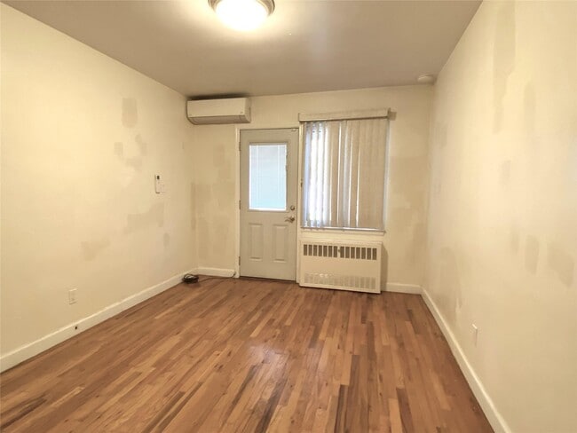 Building Photo - 210-15 42nd Ave