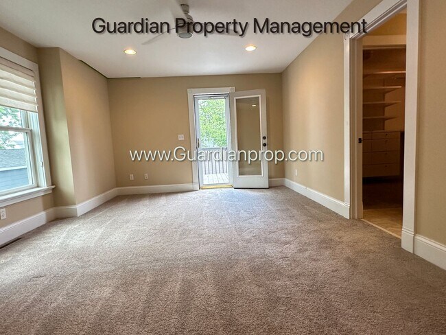 Building Photo - Downtown Hopkins SFH, Fenced Yard, Patio, Spacious Primary, 4 Car Detached Garage