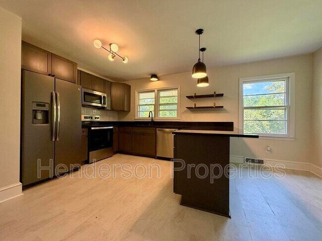 Building Photo - 6432 Woodland Cres