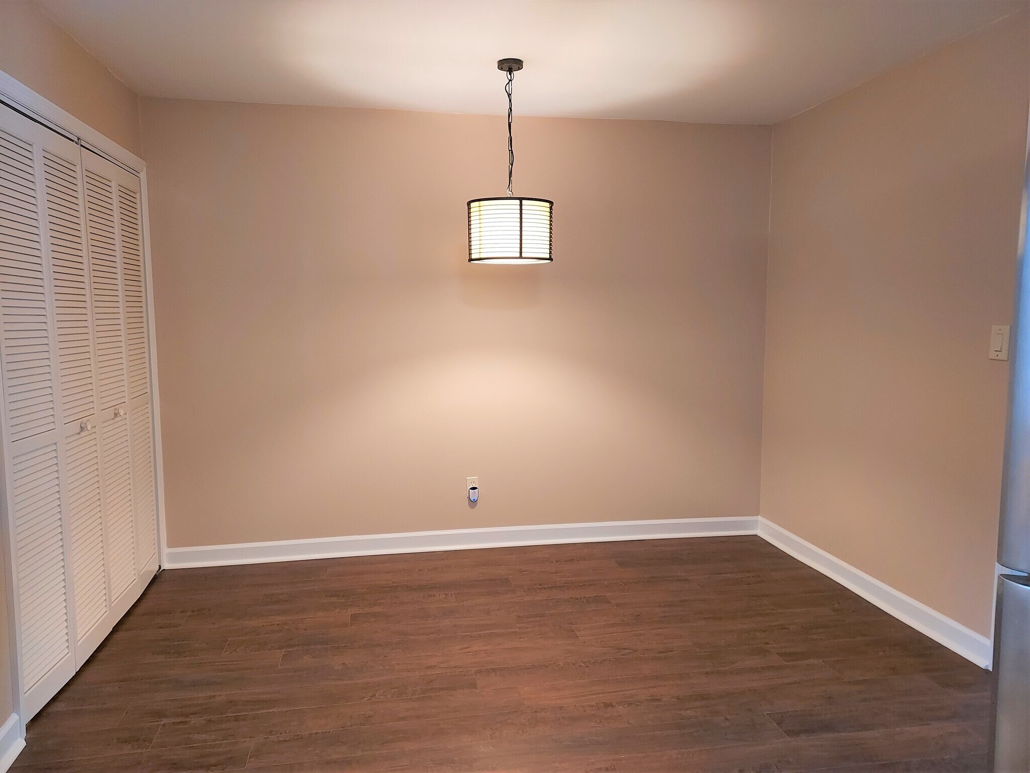 Dining room with Hidden Laundry - 11531 Jade Ln SE