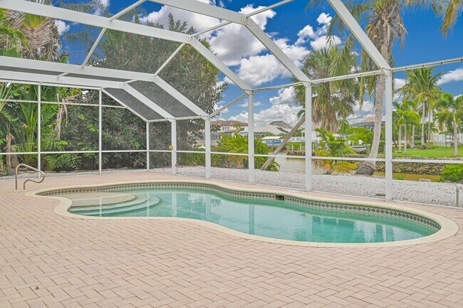 Building Photo - **Direct Gulf Access Pool Home! 4 BED/3 BA...