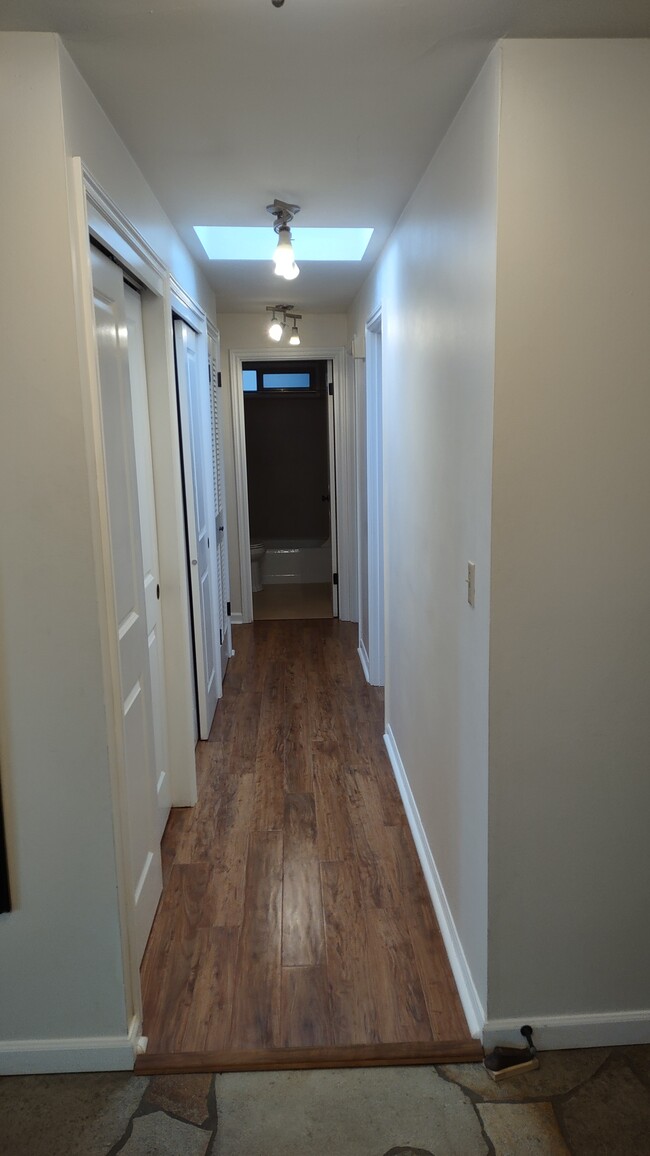 Hallway with two double closets and washer/dryer - 2215 W Raye St