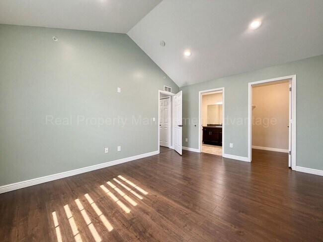 Building Photo - Rare Corner Upper Condo with Vaulted Ceilings, Private Balcony and 2 Car Garage - Right Across fr...