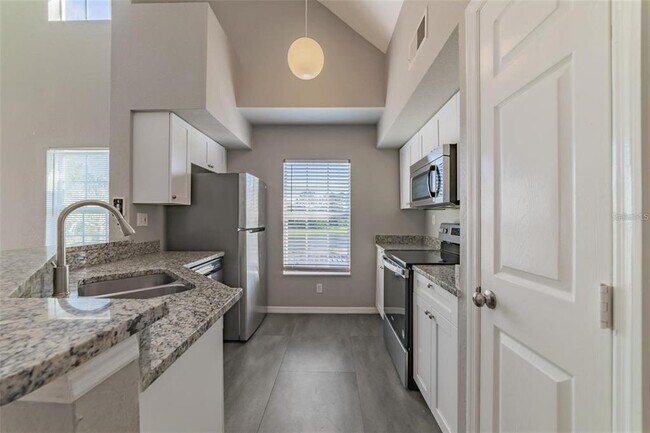 Building Photo - 9028 Lake Chase Island Way