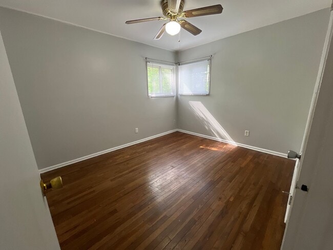 Building Photo - 3 BR 1.5 BA split-level with attached 1 car garage