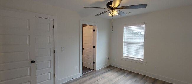 Building Photo - 5-bedroom home with 3 car garage and fully...