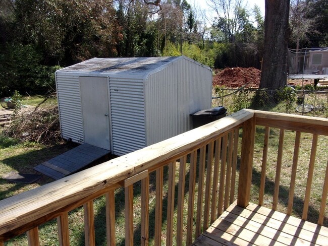 Building Photo - Cute House with Large Backyard and Deck