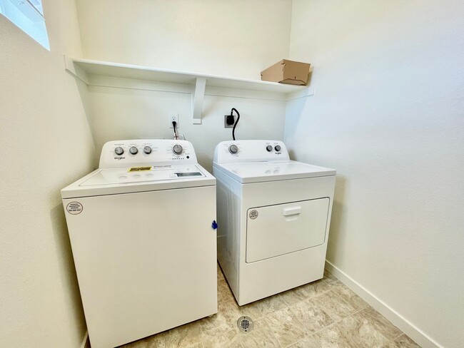 Building Photo - Spacious 4-Bedroom Wellington Home with 3-Car Garage, Loft & Fenced Backyard!