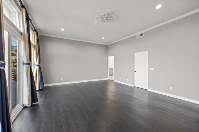 Building Photo - Modern Elegance Meets Scenic Privacy in Be...