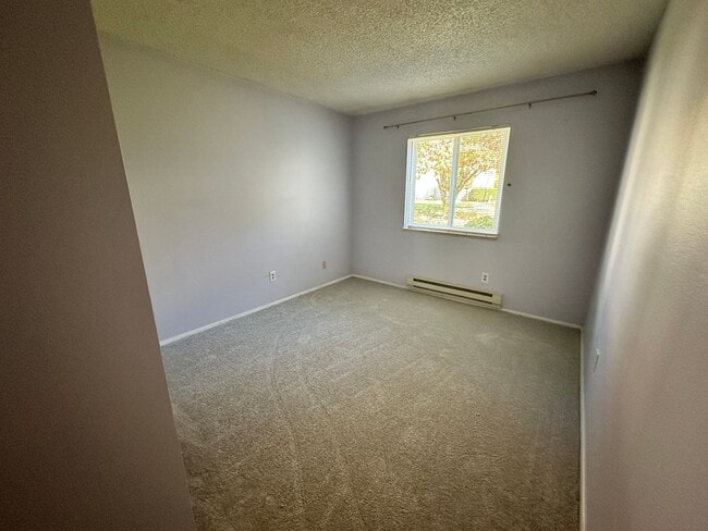 Building Photo - 3-Bedroom Unit on one level with a 1-car garage! Rent includes water-sewer and garbage!