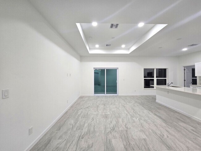 Building Photo - Brand-New 4BR/2BA Luxury Home with 2-Car Garage – Desirable 33971 Location