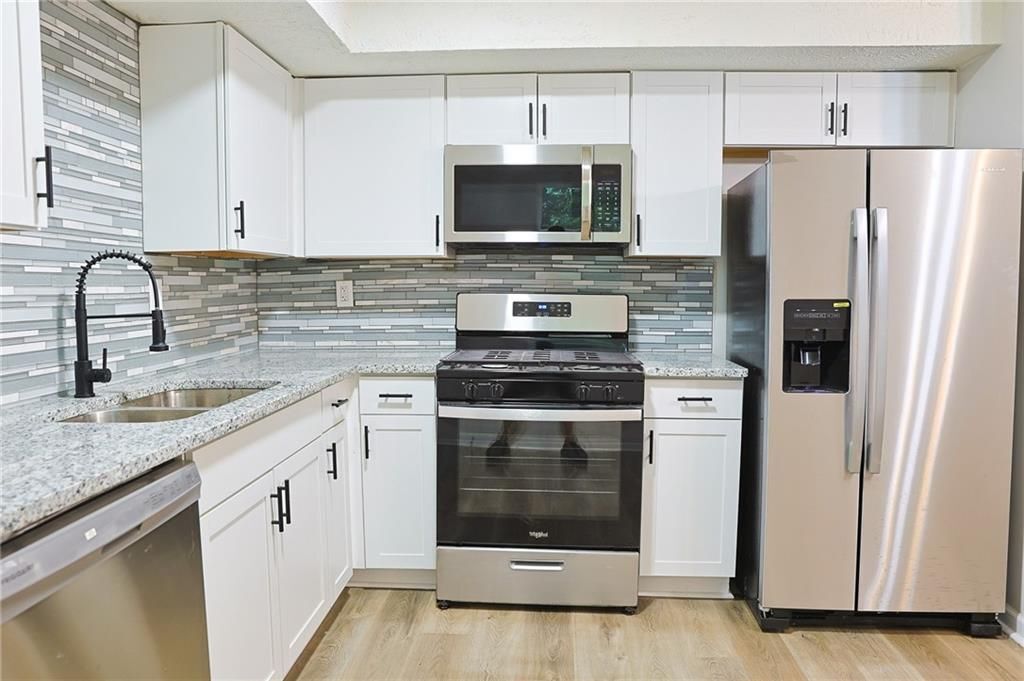 Building Photo - 4411 Flakes Mill Rd