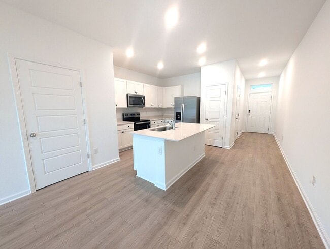 Building Photo - BRAND NEW 3 Bedroom, 2.5 Bath - End Unit - Townhome with Upgrades - located on the Westside - CLO...