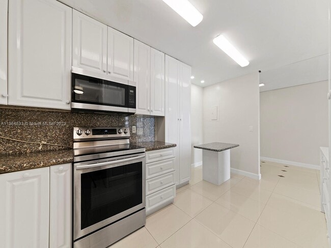 Building Photo - 9801 Collins Ave