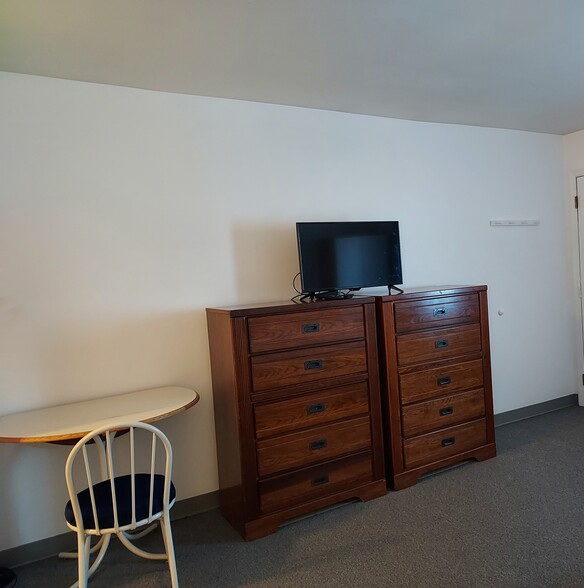 Living area: TV, dressers - 212 Potomac Ave