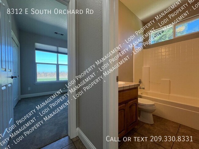 Building Photo - 8312 E Orchard Rd