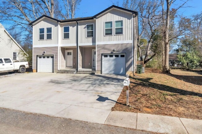 Building Photo - Elegant 3 Bedroom, 2.5 Bathroom Duplex with 1-Car Garage in Woodruff $1650/mo rent