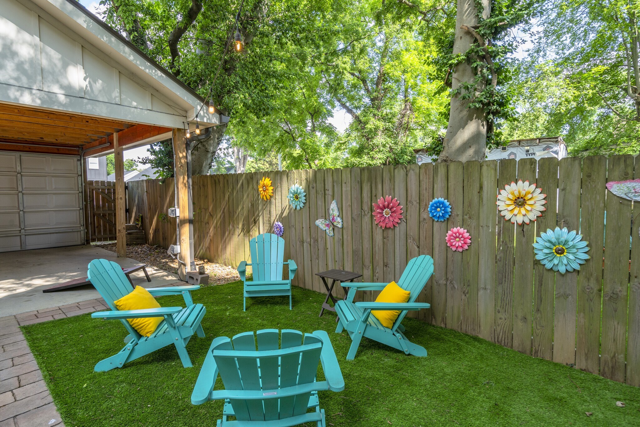 Green space seating area with Adirondack seating - 1910 11th Ave N