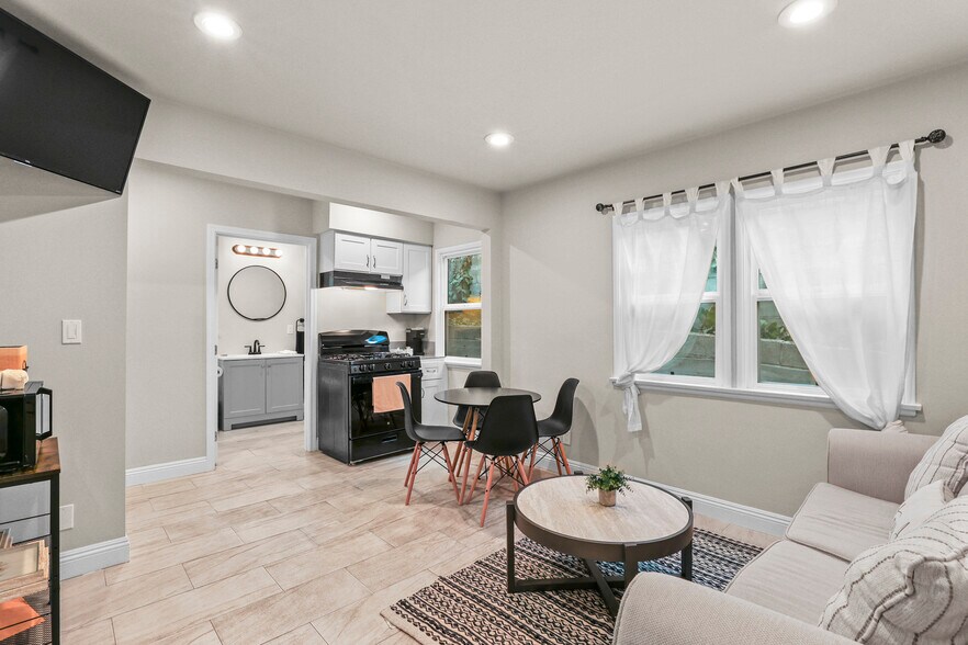 living room looking into kitchen - 610 E Fairview Blvd