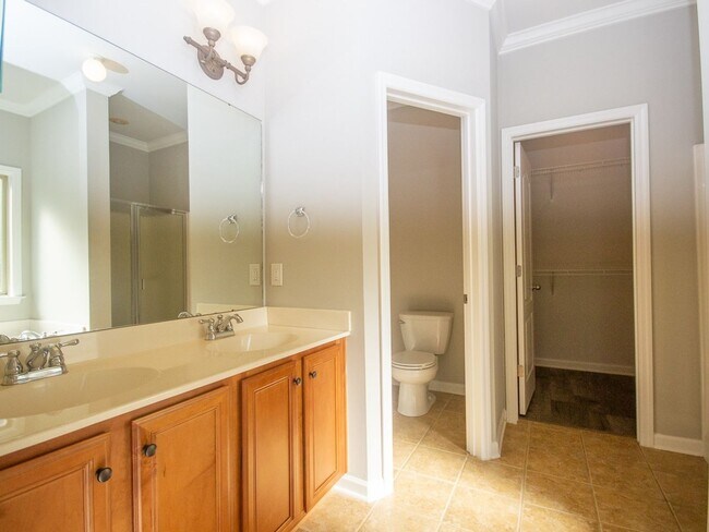 Building Photo - Gorgeous Corner-Lot Home in Canebrake Club – Lawn Care Included