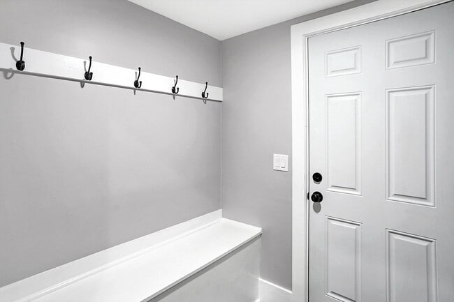 Building Photo - MOVE IN SPECIAL - Modern, Chic and brand new 2 bedroom with an office -   Discover This Home That...