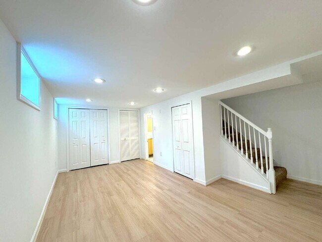 Building Photo - Charming 2BR Townhome with Finished Basement, Fenced Yard & Private Driveway Near Huntington Metro