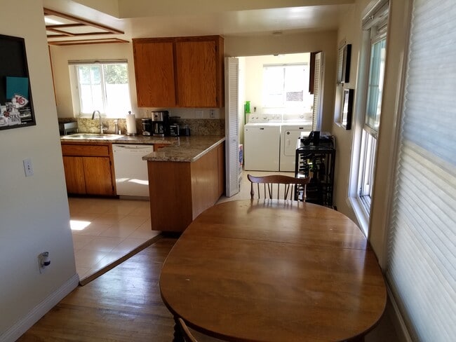Dining area and kitchen - 610 Pine Dr