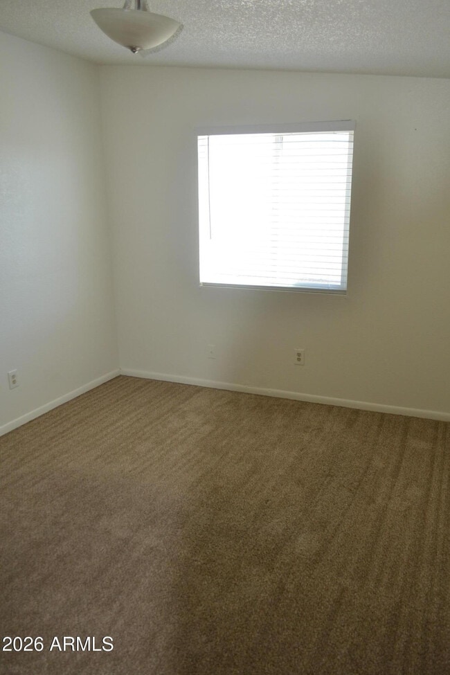 Building Photo - 1551 E 28th Ave