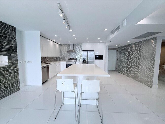 Building Photo - 19390 Collins Ave