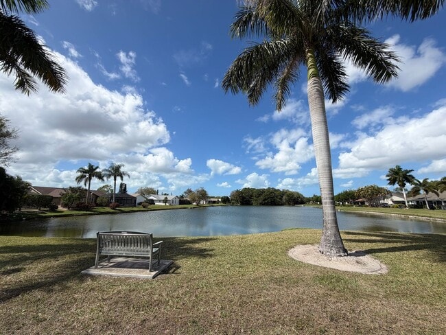 Building Photo - ANNUAL RENTAL - 4 BED / 3 BATH LAKE FRONT POOL HOME IN REGENT PARK