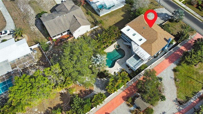 Building Photo - 4 Bed Waterfront Paradise with Pool, Dock & Gulf Access in Baileys Bluff