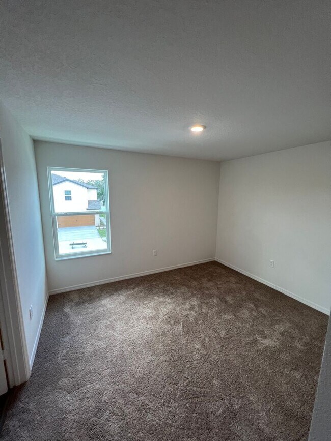 Building Photo - 2 car garage townhome-5310 Companion Lane ...