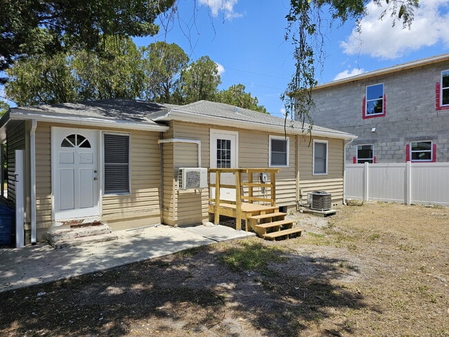 Building Photo - fully renovated 2-bedroom, 1-bathroom home with bonus guest room or office and oversized fenced yard