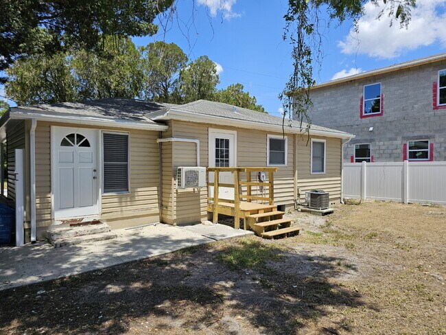 Building Photo - fully renovated 2-bedroom, 1-bathroom home with bonus guest room or office and oversized fenced yard