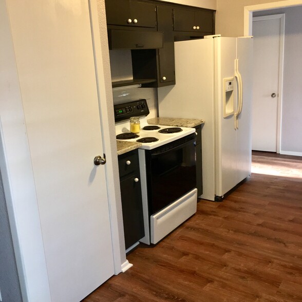 Pantry and Kitchen area - 2400 Dijon Dr