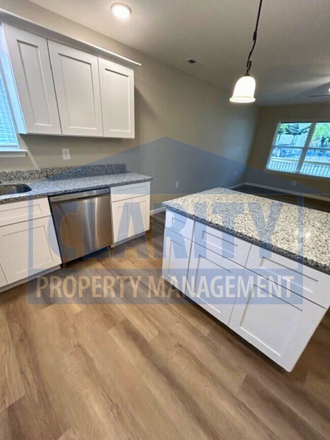 Building Photo - **One month free w/ a 15 month lease!**