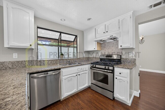 Building Photo - Spacious 4-Bedroom Retreat with 2.5 Baths