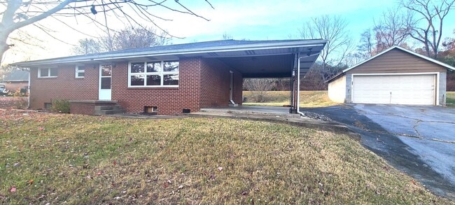 Primary Photo - Single family brick home with full unfinis...