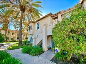 Building Photo - Beautiful Upstairs Condo Unit in the Priva...