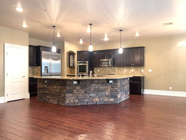 Building Photo - Four Bedrooms, Loft, and Downstairs Bedroo...