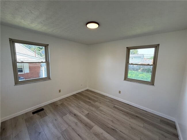 Building Photo - 7619 Bassett Dr